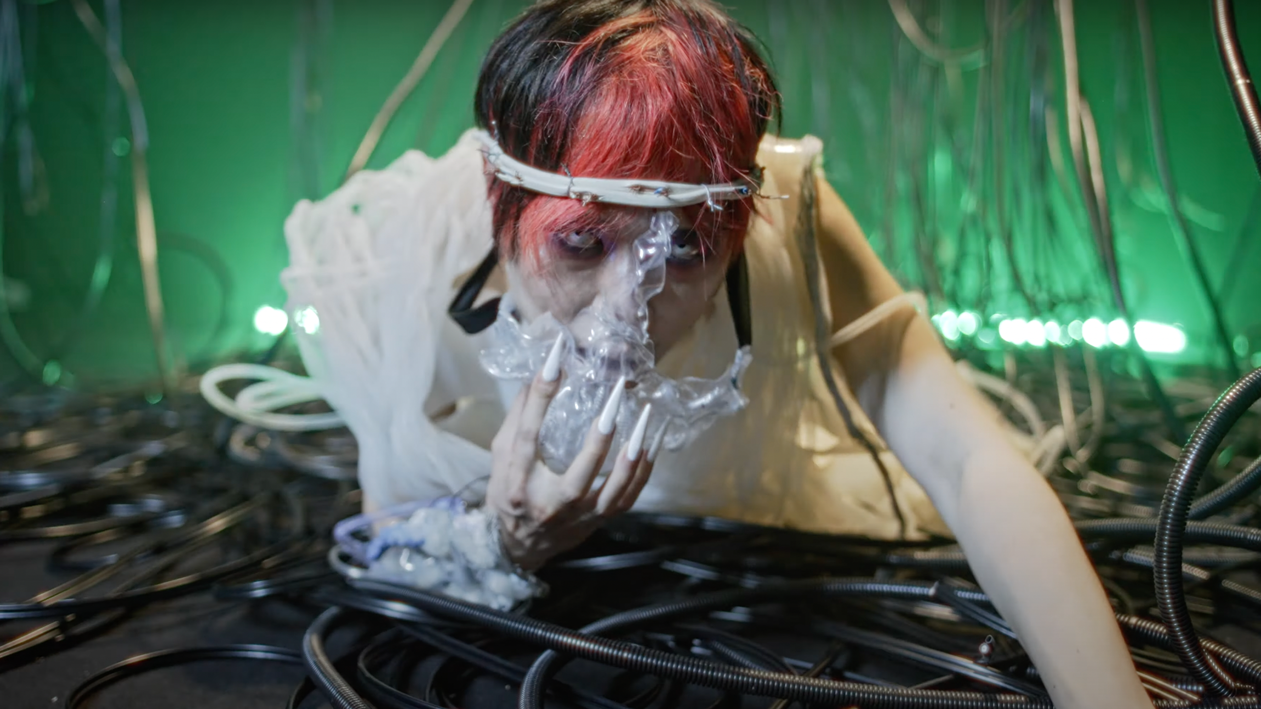 Still from the music video DM by Putochinomaricón