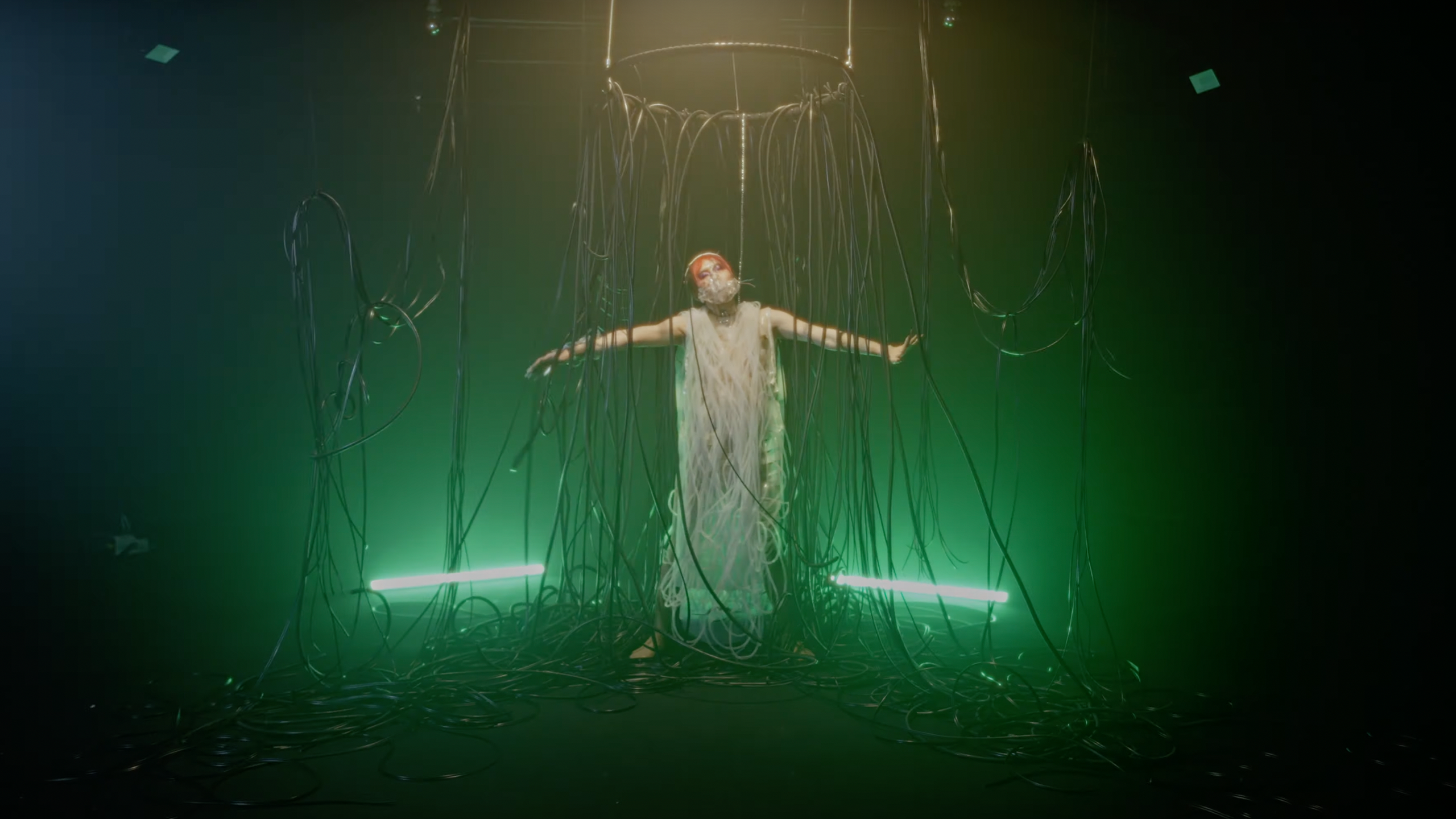 Still from the music video DM by Putochinomaricón